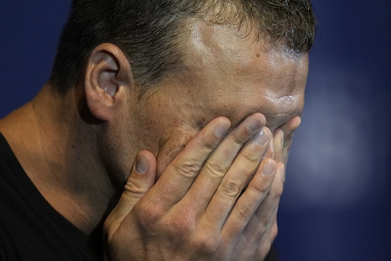 Ryan Lochte crys during an interview Friday after the men's 200 individual medley during wave 2 of the U.S. Olympic Swim Trials in Omaha, Neb. - Photo by Jeff Roberson of The Associated Press