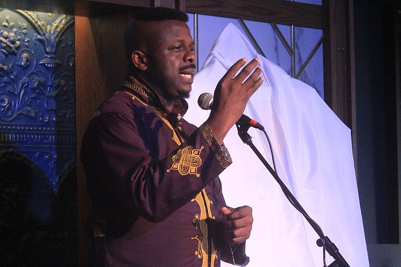 United Nations Arts Ambassador Ibiyinka Alao speaks Thursday, June 17, 2021, at the unveiling of the Fort Smith International Film Festival poster.