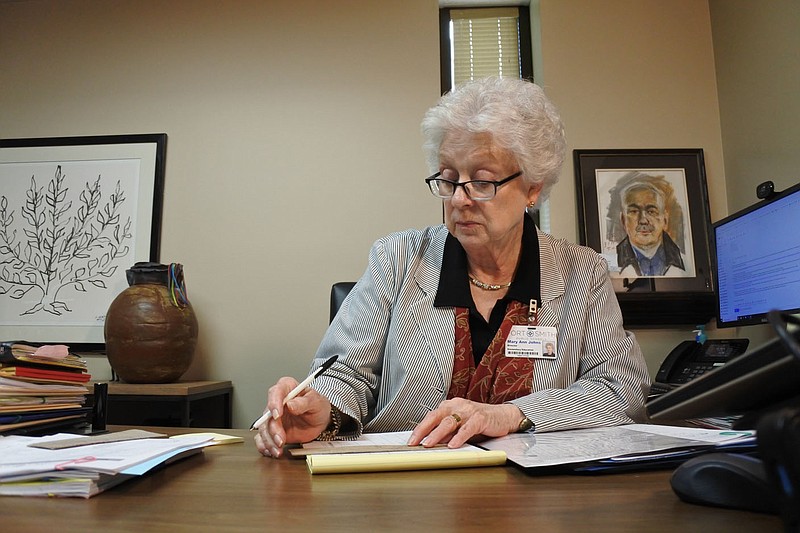 Mary Ann Johns, director of elementary education for the Fort Smith School District, works in her office on June 8. 
(NWA Democrat-Gazette/Thomas Saccente)