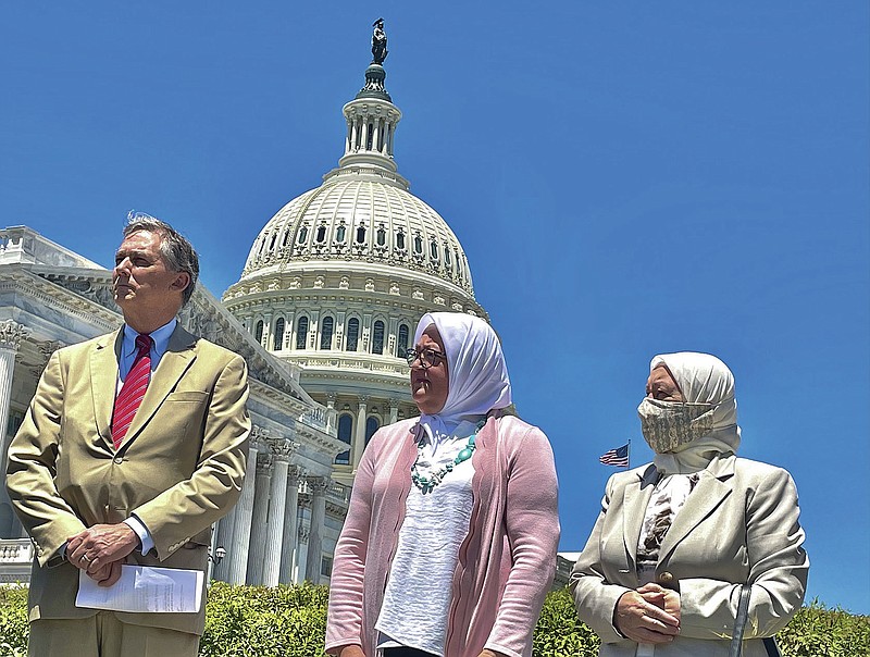 Left to right US Rep. French Hill stands beside Samar Hamwi, the sister of Syrian detainee Majd Kamalmaz as well as the hostage’s mother, Mouna Kamalmaz, at a press conference Thursday June 17, 2021 announcing the formation of a congressional task force to help bring detainees home. Majd Kamalmaz used to live in Arkansas. (Arkansas Democrat-Gazette/Frank Lockwood).