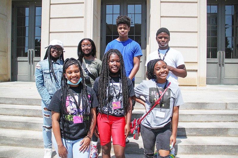 Southeast Arkansas teens attend the Fay Jones School of Architecture and Design Summer Camp June 13-18 at the University of Arkansas at Fayetteville. Participants were (front row from left) Trinity Tillman, Madison Bruce, and Kendall Jones; (back row from left) Syncere Gary, TiShunte Jenkins, Brandon Barnett and Jacobi Seals. (Special to The Commercial/Fay Jones School of Architecture and Design, U of A at Fayetteville)