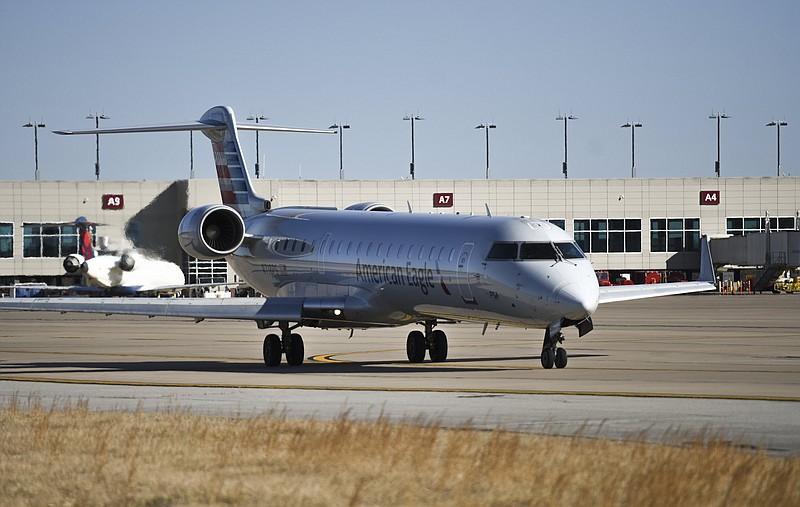 A commercial plane departs from the Northwest Arkansas National Airport in Bentonville in this Friday, Jan. 22, 2021, file photo. (NWA Democrat-Gazette/Charlie Kaijo)
