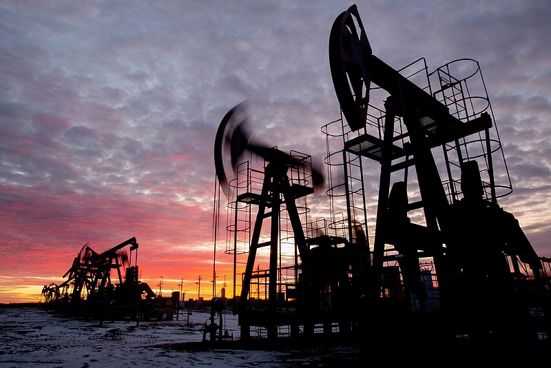 Oil pumping jacks in an oilfield near Neftekamsk, in the Republic of Bashkortostan, Russia, on Nov. 19, 2020. MUST CREDIT: Bloomberg photo by Andrey Rudakov.
