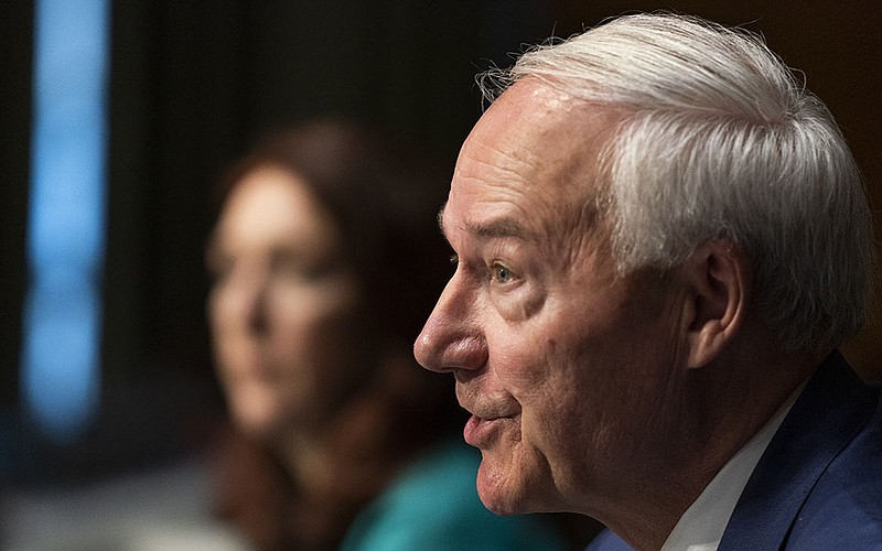 Arkansas Gov. Asa Hutchinson and Office of National Drug Control Policy Acting Director Regina LaBelle, testify before a Senate Judiciary Committee hearing on Federal sentencing for crack and powder cocaine, on Capitol Hill in Washington, Tuesday, June 22, 2021. (AP Photo/Manuel Balce Ceneta)