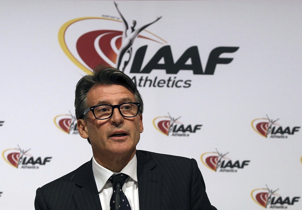 FILE - In this June 17, 2016 file photo, IAAF President Sebastian Coe speaks during a news conference after a meeting of the IAAF Council at the Grand Hotel in Vienna, Austria. Virtually every major executive and organization in the sport, including USA Track and Field, and its president, Vin Lananna, and World Athletics president Sebastian Coe, and former USATF head Craig Masback either has, or once had, some strong connection to Nike. (AP Photo/Ronald Zak, File)