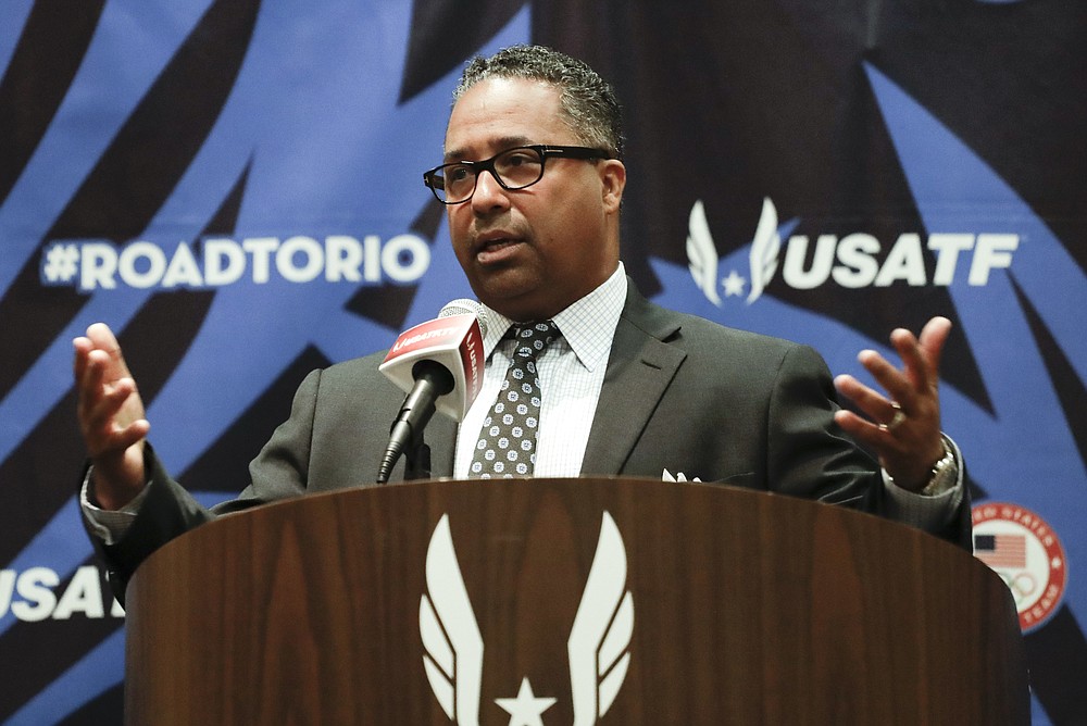 FILE - Max Siegel, CEO of USA Track & Field, talks during a news conference at the U.S. Olympic Track and Field Trials in Eugene Ore., in this Tuesday, July 5, 2016, file photo. The connection that might best illustrate the tangled web Nike weaves with its running partners is the 23-year sponsorship deal worth a reported $500 million it cut with USA Track and Field back in 2014. It was widely criticized in some corners — USATF CEO Max Siegel took heat for underselling the sport's growth potential with an arrangement set to last through 2040. (AP Photo/Matt Slocum, File)