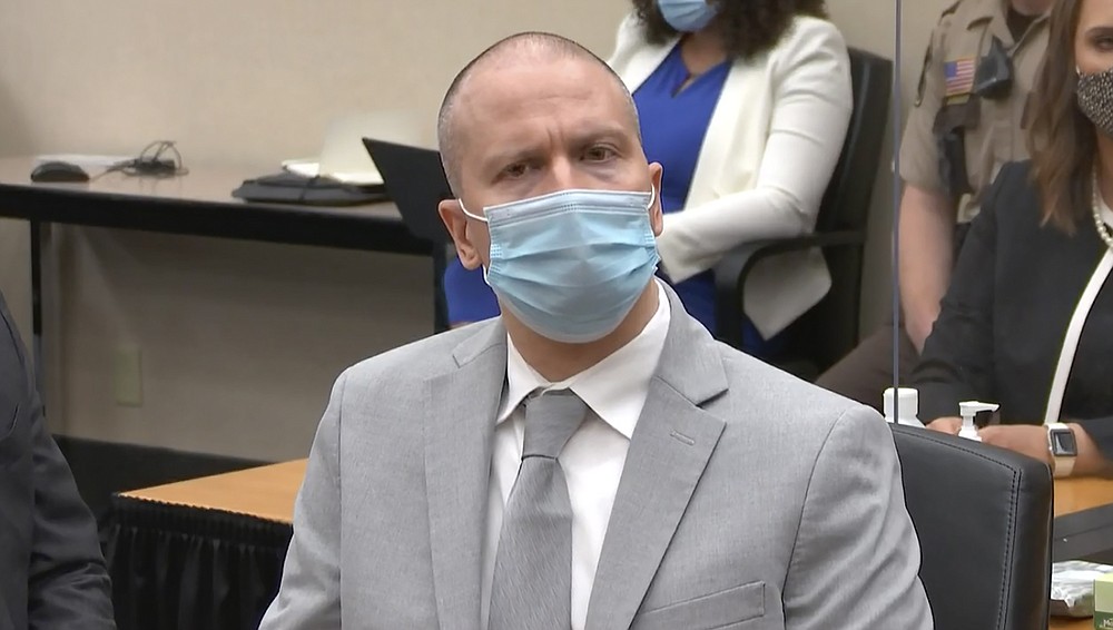 In this image taken from video, former Minneapolis police Officer Derek Chauvin listens as Hennepin County Judge Peter Cahill sentences him to 22 1/2 years in prison, Friday, June 25, 2021, for the May 25, 2020, death of George Floyd,  at the Hennepin County Courthouse in Minneapolis. (Court TV via AP, Pool)