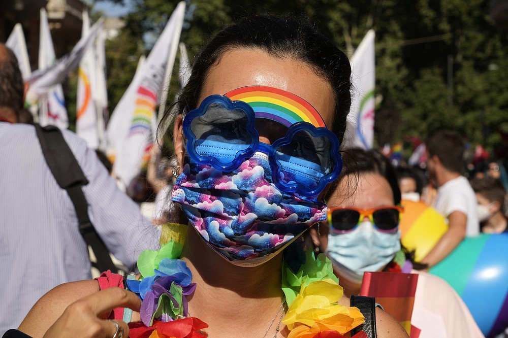 People take part in the annual Pride March, in Rome, on Saturday, June 26, 2021. This year's march comes amid widespread concern in Europe over legislation in Hungary that will prohibit showing children content on the issues. LGBT and a controversial communication from the Vatican to Italy, criticizing a law that would extend additional protections against discrimination to the LGBT community.  (AP Photo / Gregorio Borgia)