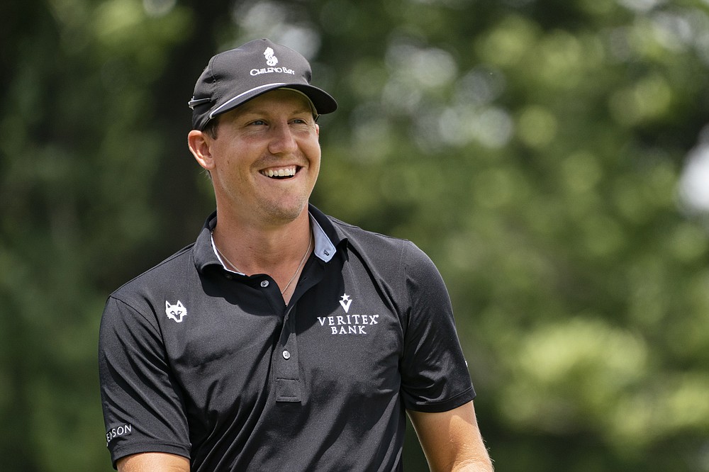 Kramer Hickok smiles before teeing off on the first hole during the third round of the Travelers Championship golf tournament at TPC River Highlands, Saturday, June 26, 2021, in Cromwell, Conn. (AP Photo/John Minchillo)