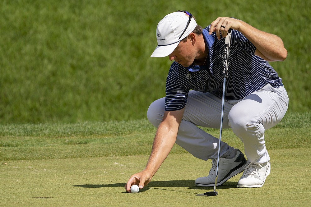 Kramer Hickok lines up his shot on the sixth green during the second round of the Travelers Championship golf tournament at TPC River Highlands, Friday, June 25, 2021, in Cromwell, Conn. (AP Photo/John Minchillo)