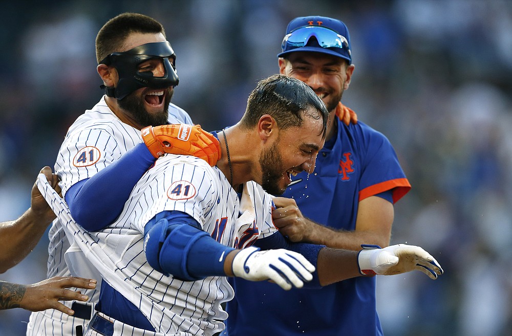 Rookie Jacob Young's single concludes the Nationals' rally for a 3-2 win  over the Mets