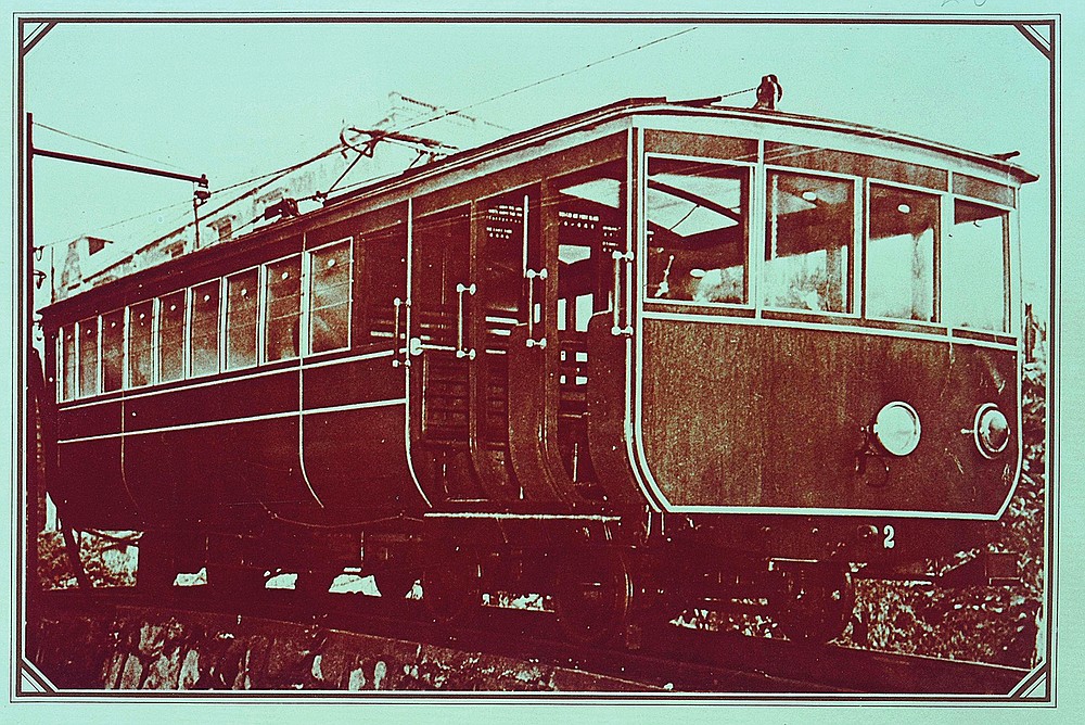 In this undated photo provided by Hong Kong Peak Tramways, a 2nd generation Peak Tram that served from 1926 to 1948 is seen in Hong Kong.  The Peak Tram began operating in 1888, when Hong Kong was a British colony, to transport people to Victoria Peak instead of using sedan chairs.  The original cars were made of varnished wood and could accommodate 30 passengers in three classes.  (Hong Kong Peak Tramways via AP)