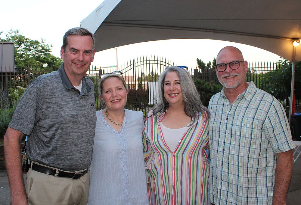Scott and Kyla Price (from left) and Kelly and Scott Syer gather at Red, White and Baby Blue.
(NWA Democrat-Gazette/Carin Schoppmeyer)