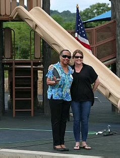 Glenda Patterson, Rotary Club of Fayetteville 2021 Fred Vorsanger Award recipient, stands with Kelly Gemmell at the organization’s 100th anniversary and Service Above Self Picnic June 5 at Rotary Playground at Mount Kessler in Fayetteville. (Courtesy photo)