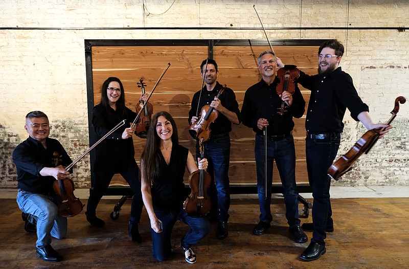 Members of the Fort Smith Symphony get together for a photo shoot ahead of the 2021-22 season, which begins Sept. 11.

(Courtesy Photo/Laken Emerson)