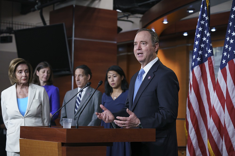 House Intelligence Committee Chairman Adam Schiff, D-Calif., right, talks as Speaker of the House Nancy Pelosi, D-Calif., far left, announces her appointments to a new select committee to investigate the violent Jan. 6 insurrection at the Capitol, including from left, Rep. Elaine Luria, D-Va., Rep. Jamie Raskin, D-Md., and Rep. Stephanie Murphy, D-Fla., on Capitol Hill in Washington, Thursday, July 1, 2021. The probe will examine what went wrong around the Capitol when hundreds of supporters of then-President Donald Trump broke into the building, hunted for lawmakers and interrupted the congressional certification of Democrat Joe Biden's election victory. (AP Photo/J. Scott Applewhite)