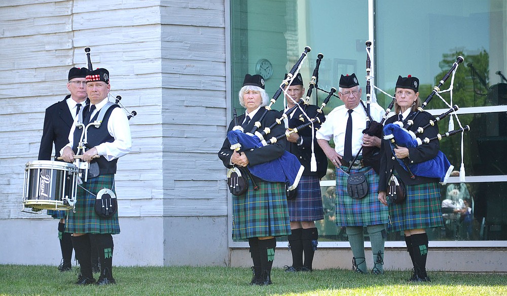 Bagpipes resounded for a portion of the outdoor memorial service for Pea Ridge Police Officer Kevin Apple Friday, July 2, 2021.