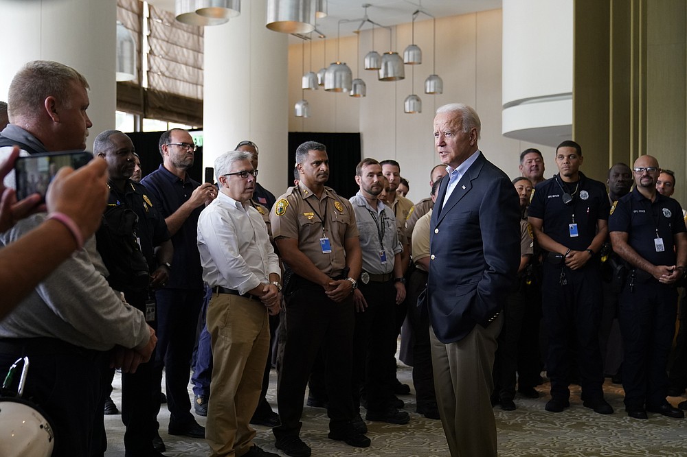 President Joe Biden meets with first responders in Miami Beach, Fla., Thursday, July 1, 2021, who were working on the condo tower that collapsed in Surfside, Fla., last week. (AP Photo/Susan Walsh)