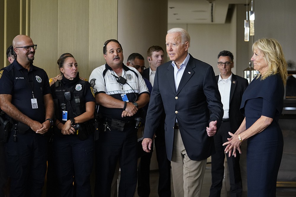 President Joe Biden and first lady Jill Biden arrive to meet with first responders in Miami Beach, Fla., Thursday, July 1, 2021, who were working on the condo tower that collapsed in Surfside, Fla., last week. (AP Photo/Susan Walsh)