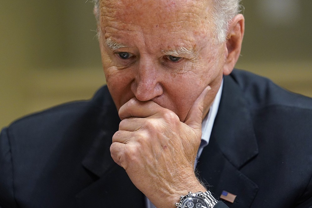 President Joe Biden listens during a briefing with first responders and local officials in Miami, Thursday, July 1, 2021, on the condo tower that collapsed in Surfside, Fla., last week. (AP Photo/Susan Walsh)