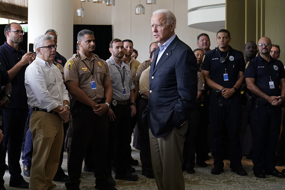 President Joe Biden meets with first responders in Miami Beach, Fla., Thursday, July 1, 2021, who were working on the condo tower that collapsed in Surfside, Fla., last week. (AP Photo/Susan Walsh)