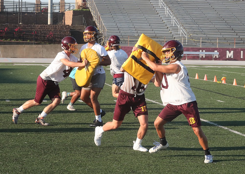 Lake Hamilton High School football players practice. File photo by Richard Rasmussen of The Sentinel-Record