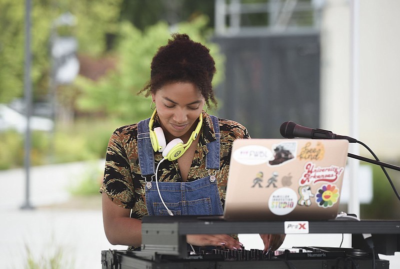 Raquel Thompson known as "DJ Raquel" performs, Sunday, June 27, 2021 at The Momentary in Bentonville. The Momentary is offering free live music featuring NWA artists, July 27 through Sept. 26 through its Courtyard Concert Series. This is a new step for the creative space, which has to date primarily focused on out-of-state artists. Check out nwaonline.com/210628Daily/ for today's photo gallery. 
(NWA Democrat-Gazette/Charlie Kaijo)