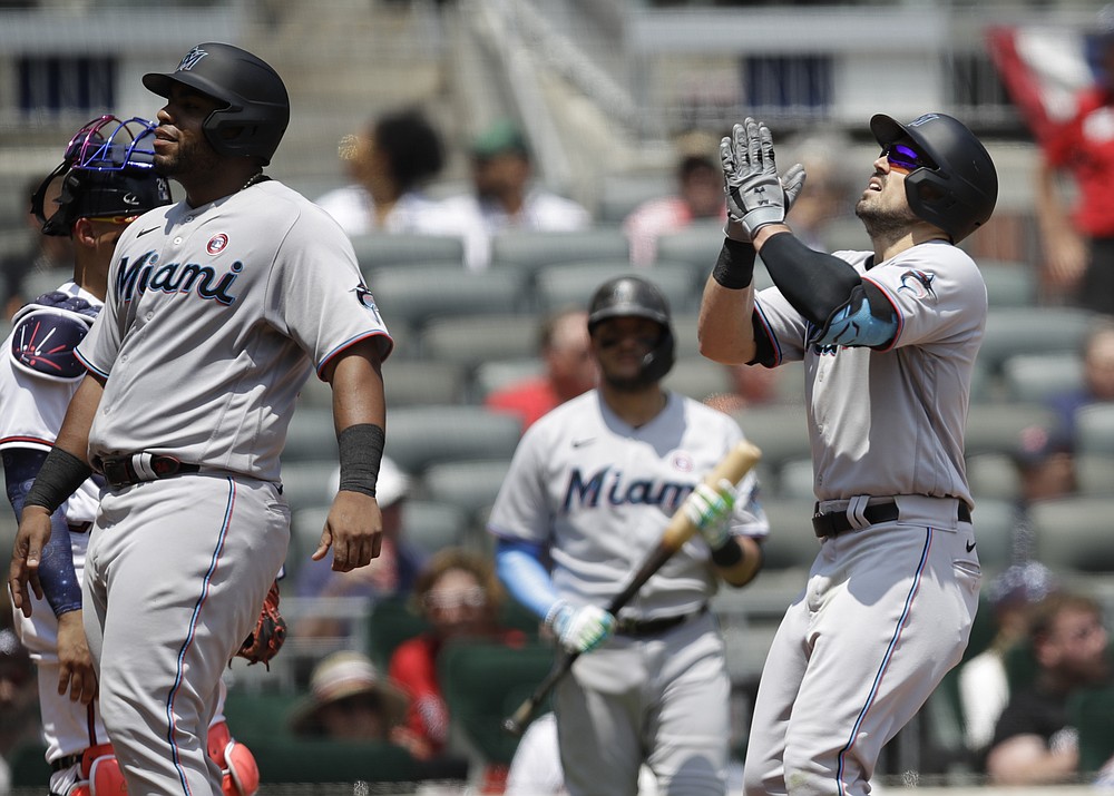 Duvall hits 2 HRs, drives in 7 as Marlins rout Braves 14-8