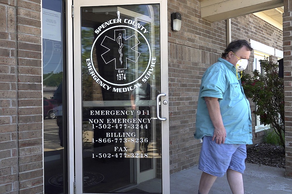 A visitor to a clinic leaves after receiving a COVID-19 vaccine in Taylorsville, Ky., on Thursday, June 17, 2021. With the U.S. falling short of President Joe Biden’s goal of having 70% of all American adults at least partially vaccinated by the Fourth of July, public health officials have shifted the emphasis. (AP Photo/Dylan Lovan)
