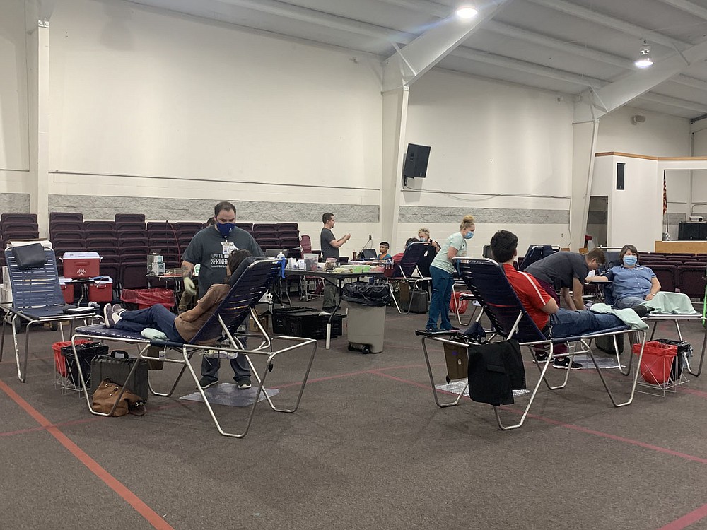 PHOTO BY ALEXUS UNDERWOOD The Pineville Christian Church is converted into a room filled with medical supplies and tables for blood collection.  Donors can register before the trip or travel to donate.