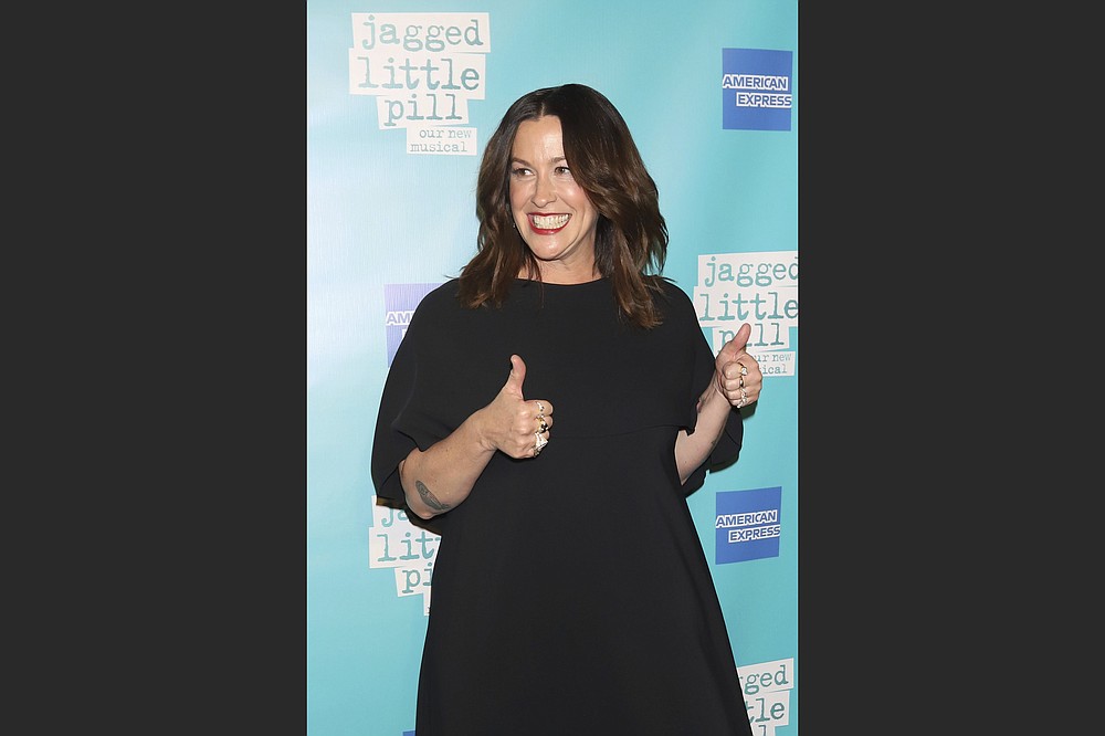 Alanis Morissette, with opening acts Garbage and Liz Phair, performss Aug. 18 at the Walmart AMP in Rogers. (AP file photo/Greg Allen/Invision)
