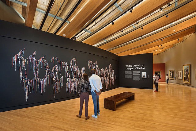 “We the People” by Nari Ward welcomes visitors to the Early American Art Galleries at Crystal Bridges Museum of American Art. “Ward asks us to reconsider the phrase. Has its meaning changed? Who are ‘the people’? How do these words apply to our society today?” the art label states.

(Courtesy Crystal Bridges Museum of American Art, Bentonville)