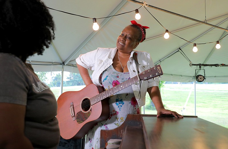 Miche Braden (right) plays Sister Rosettaa Tharpe with Johnique Mitchell as Marie Knight in the Arkansas Repertory Theatre's "Marie & Rosetta," opening today July 13 in War Memorial Park. (Special to the Democrat-Gazette/Stephen Thornton)