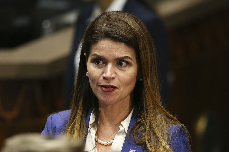 FILE - In this Jan. 13, 2020, file photo, Democratic Tucson Mayor Regina Romero is seen at the State of the State address at the Arizona Capitol in Phoenix. Officials in the city of Tucson plan to ignore Arizona's new "Second Amendment sanctuary" law that bars state and local governments from enforcing certain federal gun regulations, possibly setting up a court fight as a growing number of cities and counties in the U.S. declare themselves similar firearm havens. The move by Mayor Romero and the City Council again puts Tucson and Republican-led state at odds over how to regulate gun sales and use. (AP Photo/Ross D. Franklin, File)