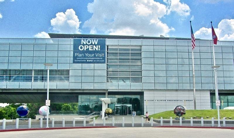 A banner at William J. Clinton Presidential Center proclaims its reopening. (Special to the Democrat-Gazette/Marcia Schnedler)