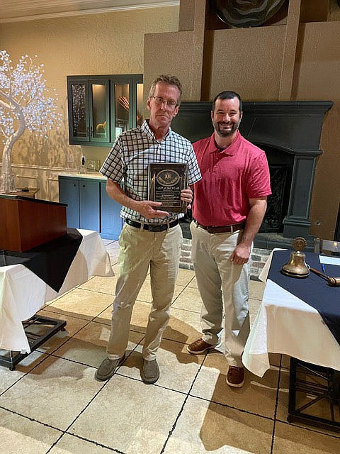 Danny Walters, Fayetteville Lions Club immediate past-president receives “Lion of the Year” award from current president Andrew Aldridge at Mermaids Restaurant on Wednesday, July 7.

(Courtesy Photo)