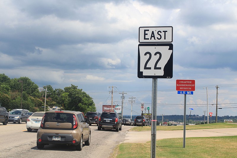 Vehicles travel eastbound on Arkansas Highway 22, or Rogers Avenue, just east of the Highway 540 overpass on Monday, July 12, 2021, in Fort Smith. The Arkansas Department of Transportation plans to widen and resurface Highway 22 east of the overpass.