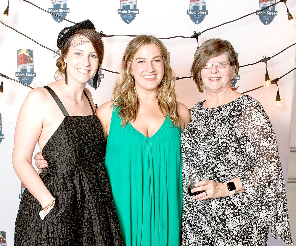 Photo Submitted Abby Trinidad (left), Taylor Justice Burns and Rhonda Jeep Rutledge pose during the Main Event 2019 at the Brick Ballroom.