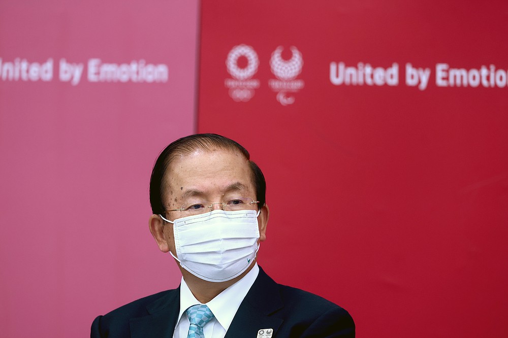 Tokyo 2020 CEO Toshiro Muto attends a press conference, in Tokyo, Thursday, July 8, 2021. (Behrouz Mehri/Pool Photo via AP)