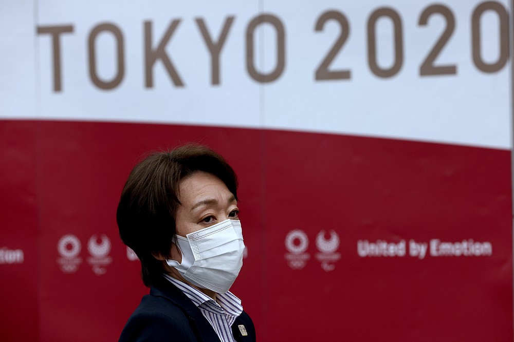Tokyo 2020 president Seiko Hashimoto looks on after the five-party meeting in Tokyo, Thursday, July 8, 2021. (Behrouz Mehri/Pool Photo via AP)