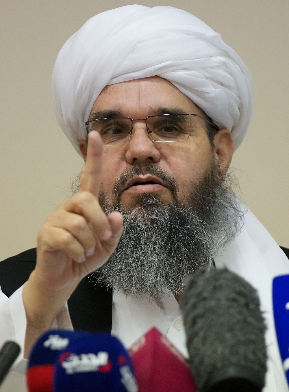 Mawlawi Shahabuddin Dilawar, member of political delegation from the Afghan Taliban's movement gestures during a news conference in Moscow, Russia, Friday, July 9, 2021. (AP Photo/Alexander Zemlianichenko)