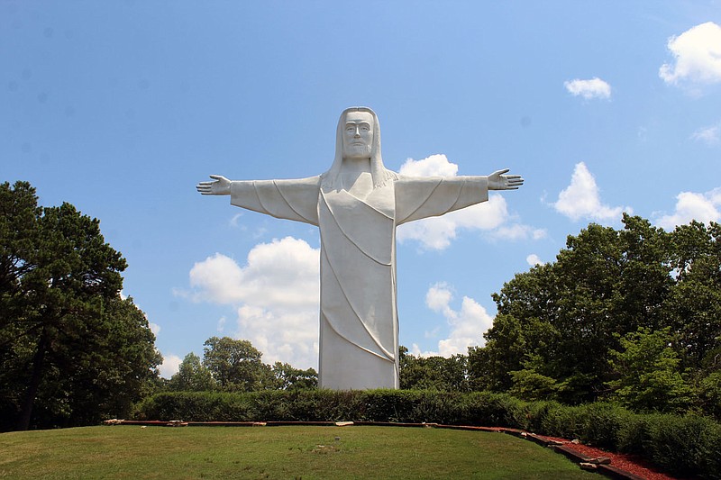 The 67-foot-high Christ of the Ozarks statue is located on the grounds of The Great Passion Play. It’s arms spread 65 feet from fingertip to finger tip and was dedicated in 1966. Activists with the group Indecline claimed credit for hanging a banner stating "God bless abortion" on the statue Thursday night. (NWA Democrat-Gazette/Mary Jordan)