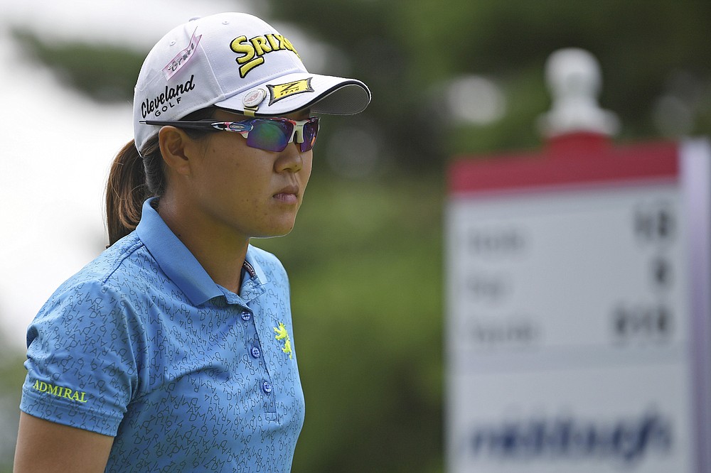 Nasa Hataoka, of Japan, examines the fairway on the 18th hole during the third round of the Marathon LPGA Classic golf tournament at Highland Meadows Golf Club in Sylvania, Ohio, Saturday, July 10, 2021, in Sylvania, Ohio. (AP Photo/David Dermer)