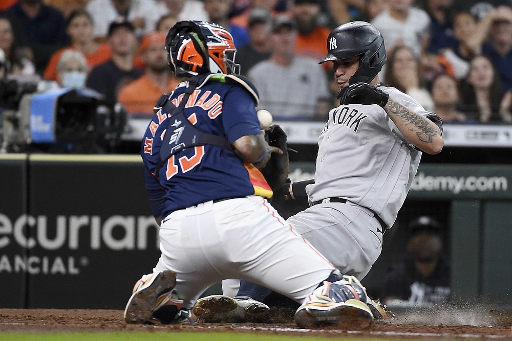 Down 5 in ninth, Astros rally to stun Yankees