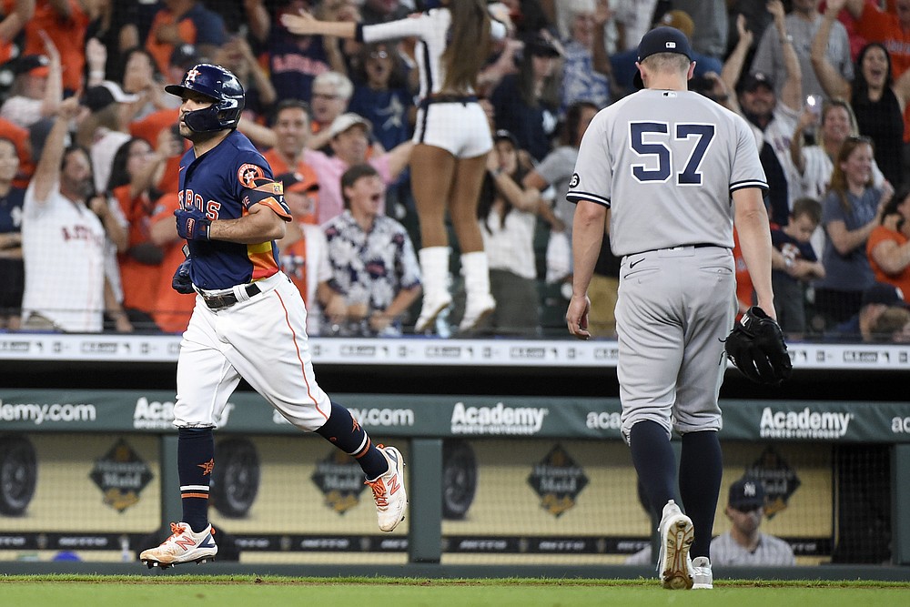 Down 5 in ninth, Astros rally to stun Yankees