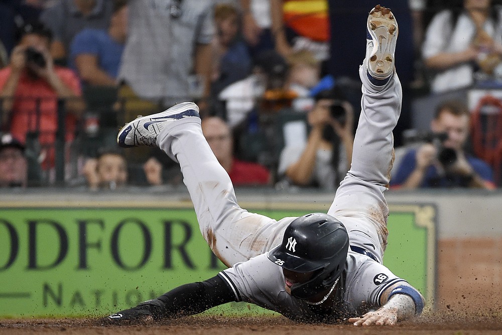 Down 5 in ninth, Astros rally to stun Yankees