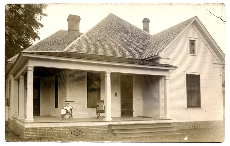 Pine Bluff, 1912: "Emily Josephine Davis, 6 mo. old 1912, on front porch of home 1517 Elm St."