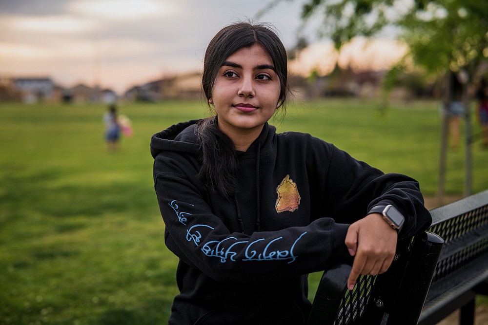 Anureet Kaur at her home in Selma, Calif., March 24, 2021. In California, a young generation of Sikh farmers has agricultural roots that stretch back 900 years. Since the farmers protests of India began last year, Kaur and a growing number of young Punjabi Sikhs have become more politically active in the Sikh community. (Ryan Christopher Jones/The New York Times)
