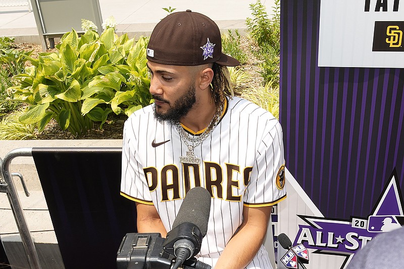 National League's Fernando Tatis Jr., of the San Diego Padres, speaks with the media prior to batting practice for the MLB All-Star baseball game, Monday, July 12, 2021, in Denver. (AP Photo/David Zalubowski)