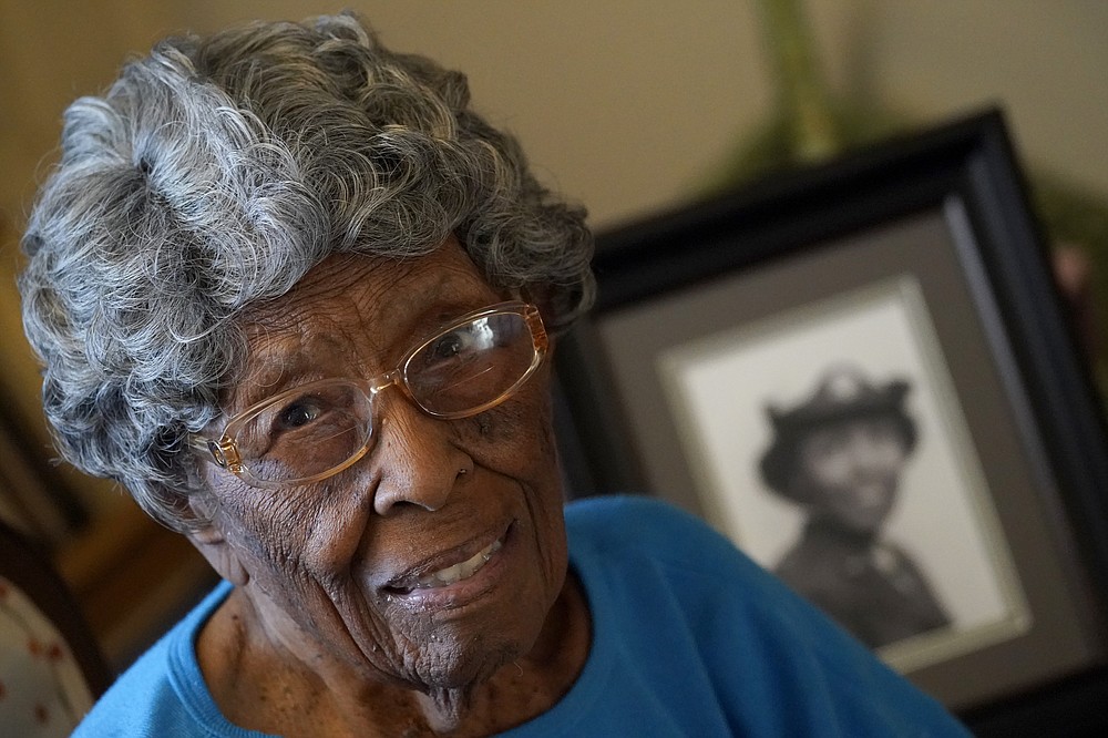 CORRECTS NAME OF BATTALION - World War II veteran Maj. Fannie Griffin McClendon poses at her home, Thursday, June 10, 2021, in Tempe, Ariz. McClendon had a storied history as a member of the 6888th Central Postal Directory Battalion that made history as being the only all-female, black unit to serve in Europe during World War II. (AP Photo/Matt York)